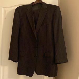 Hickey Freeman grey pinstriped suit.  Excellent condition and well maintained.